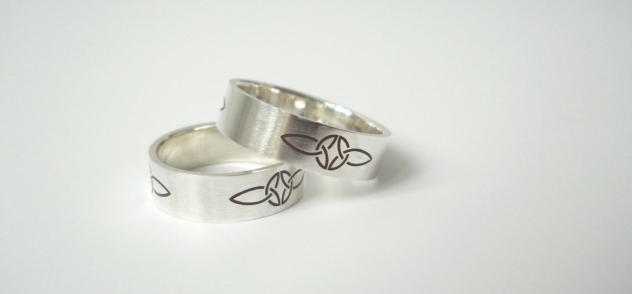 Weddings rings made of sterling silver with celtic knotwork.